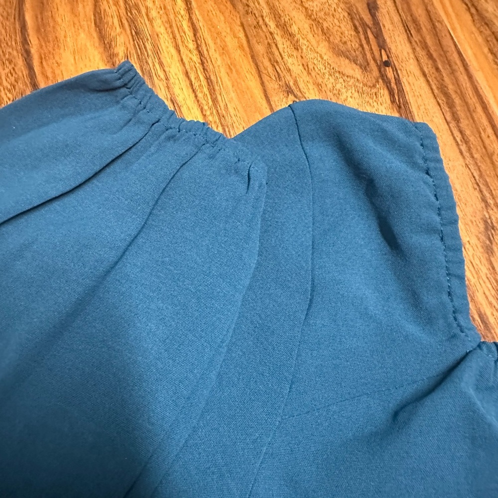 blue cropped shirt